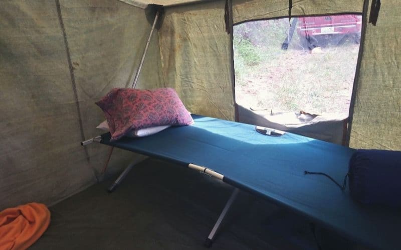 another camping cot in a tent