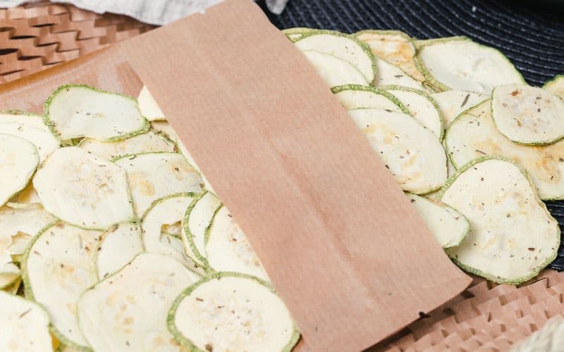 Dehydrated zucchini slices in a vacuum bag